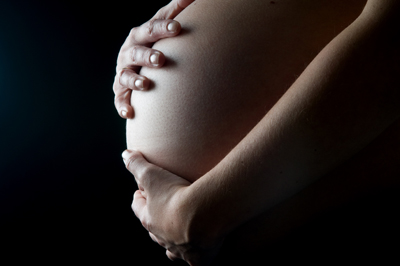 photo of pregnant woman by Marcel Mooij .... purchased from Fotolia.com  